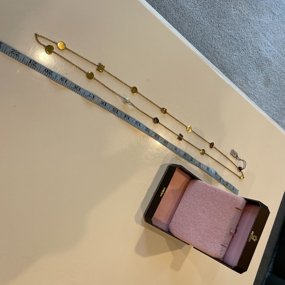 Juicy couture new black/gold long necklace